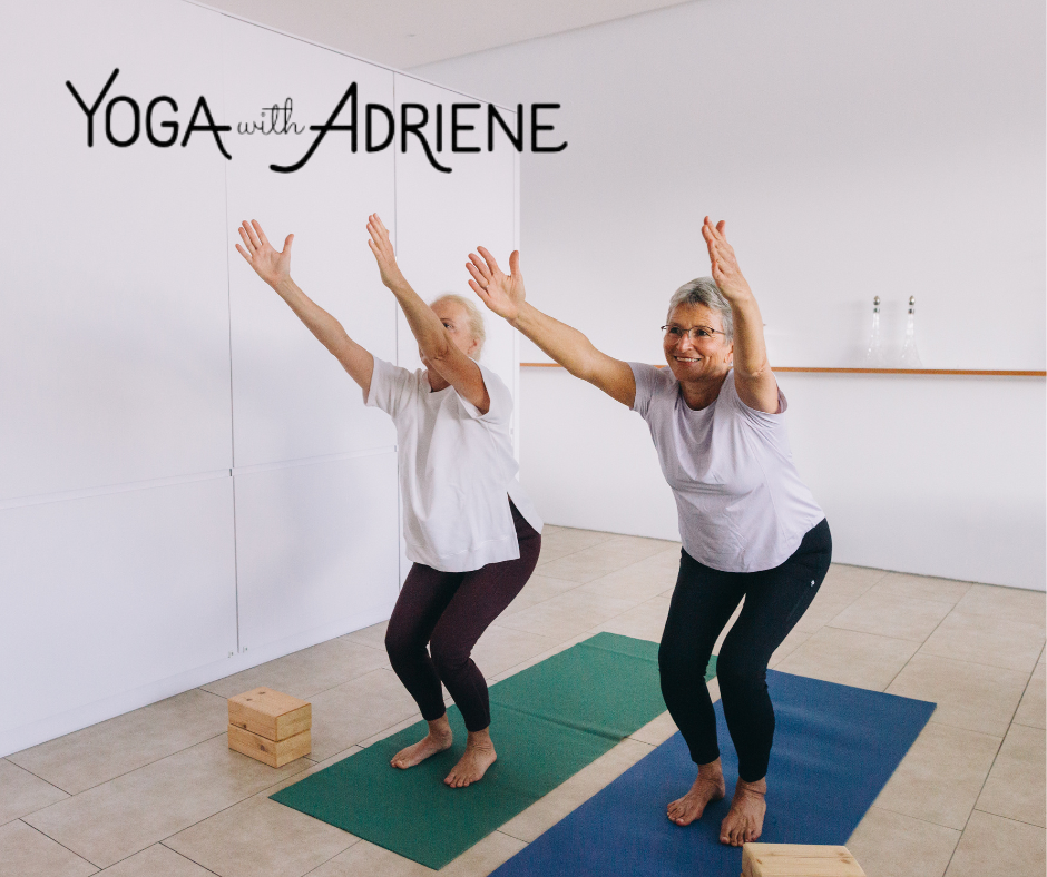 two older people doing yoga - link to Yoga with Adriene